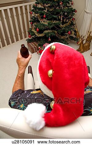 Enjoying a beer Christmas day View Large Photo Image Stock Image - Enjoying a beer Christmas day. Fotosearch
