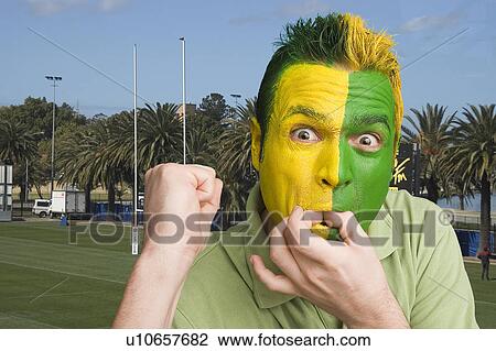 Stock Image - Excited sports fan. Fotosearch