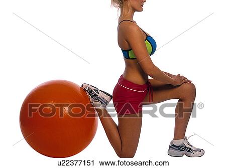 Exercise ball and a woman View Large Photo Image Stock Image - Exercise ball and a woman. Fotosearch