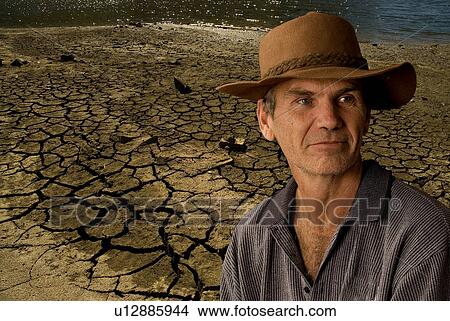 Picture - Farmer in drought. Fotosearch