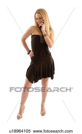 Fashionable woman on a mobile phone View Large Photo Image Stock Photography - Fashionable woman on a mobile phone. Fotosearch