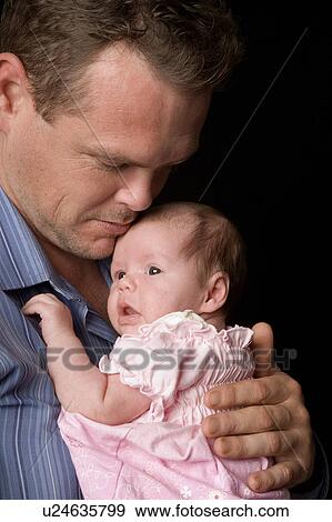 Stock Photo - Father and baby daughter. Fotosearch