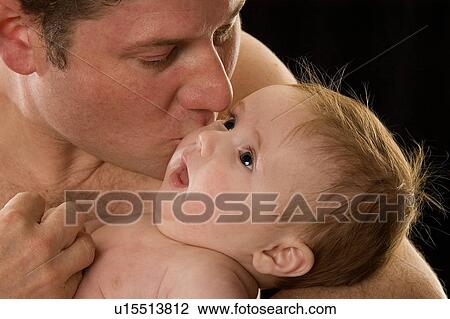 Father kissing baby boy View Large Photo Image Stock Image - Father kissing baby boy. Fotosearch