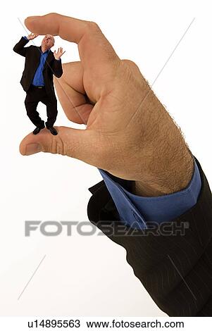 Stock Image - Feeling the squeeze. Fotosearch