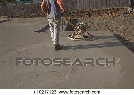 Stock Image - Finishing concrete. Fotosearch