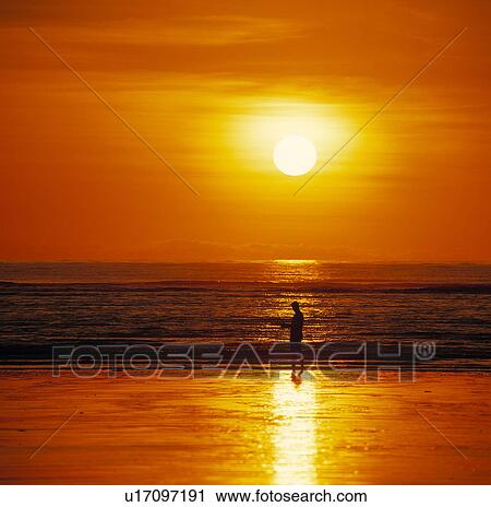 Fisherman at sunset View Large Photo Image Stock Image - Fisherman at sunset. Fotosearch