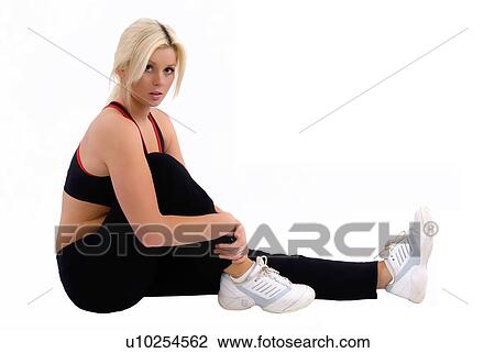 Stock Image - Fitness stretch. Fotosearch