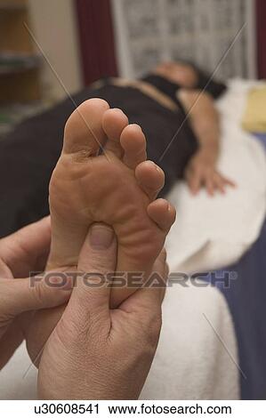 Foot massage View Large Photo Image Stock Image - Foot massage. Fotosearch