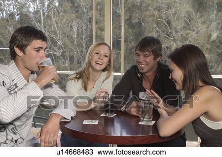 Friends at the bar View Large Photo Image Stock Image - Friends at the bar. Fotosearch