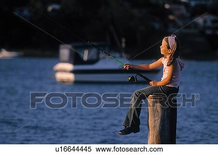 Stock Photography - Girl fishing. Fotosearch