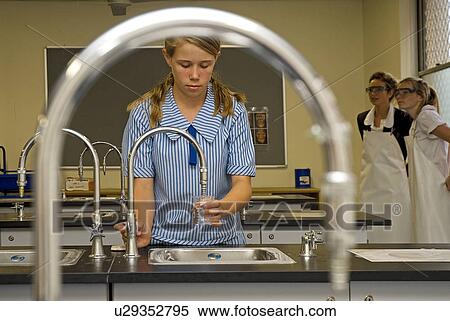 Stock Photography - Girl in science lab. Fotosearch