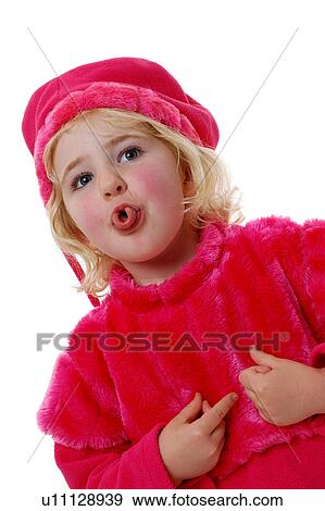 Girl sticking tongue out in a pink outfit View Large Photo Image Stock Photo - Girl sticking tongue out in a pink outfit. Fotosearch