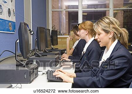 Stock Image - Girls at computers. Fotosearch