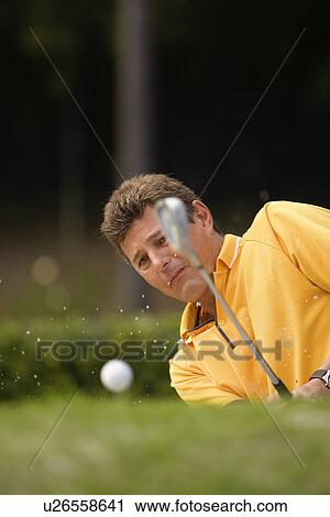 Golfer in bunker View Large Photo Image Stock Image - Golfer in bunker. Fotosearch
