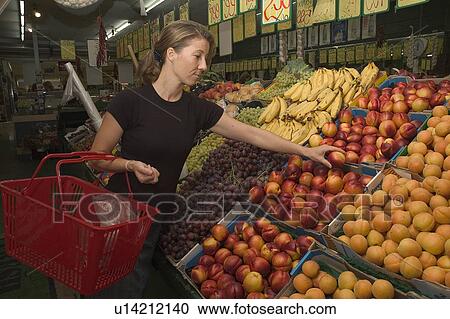 Stock Image - Grocery shopping. Fotosearch