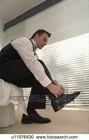 Groom getting ready View Large Photo Image Stock Image - Groom getting ready. Fotosearch