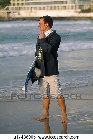 Half surfer half businessman View Large Photo Image Stock Photography - Half surfer half businessman. Fotosearch