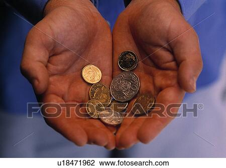 Stock Image - Handful of coins. Fotosearch
