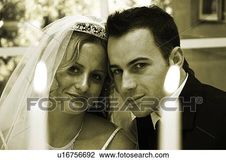 Stock Image - Happy wedding couple. Fotosearch