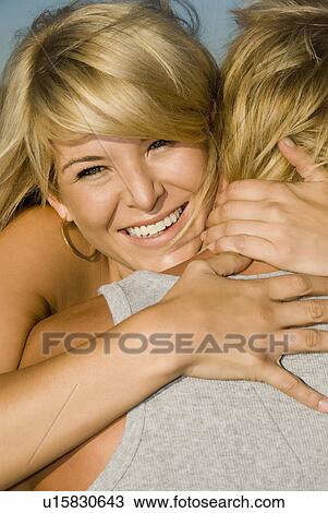 Stock Image - Happy young couple. Fotosearch