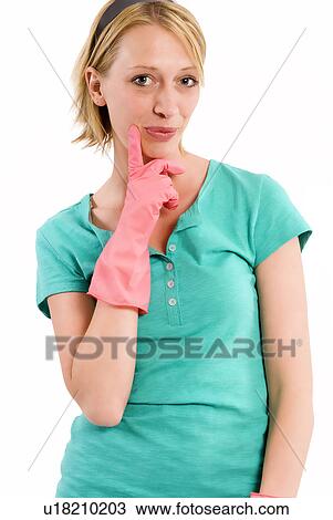 Stock Image - Housewife with rubber gloves. Fotosearch