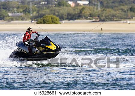 Jet ski racer View Large Photo Image Stock Image - Jet ski racer. Fotosearch