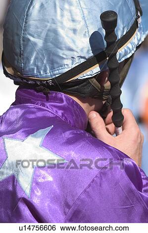 Stock Photograph - Jockey with whip. Fotosearch