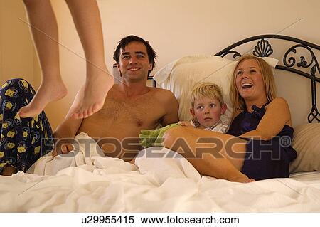 Jumping on the bed View Large Photo Image Stock Photography - Jumping on the bed. Fotosearch