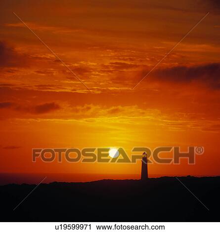 Lighthouse at sunset View Large Photo Image Stock Image - Lighthouse at sunset. Fotosearch