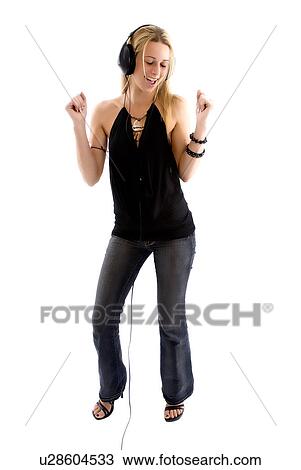 Stock Image - Listening to music. Fotosearch