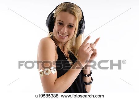 Listening to music View Large Photo Image Stock Photo - Listening to music. Fotosearch