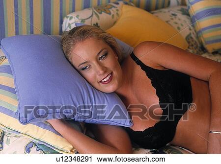 Stock Image - Lying down. Fotosearch