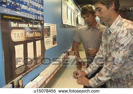 Stock Photography - Making a bet. Fotosearch