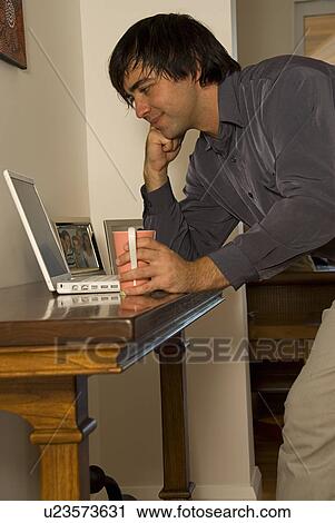 Man at computer View Large Photo Image Stock Image - Man at computer. Fotosearch