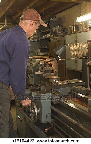 Man in a workshop View Large Photo Image Stock Image - Man in a workshop. Fotosearch