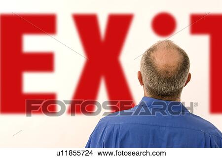 Man looking at Exit View Large Photo Image Picture - Man looking at Exit. Fotosearch