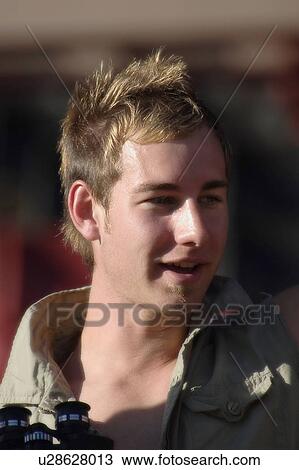 Stock Image - Man with binoculars. Fotosearch