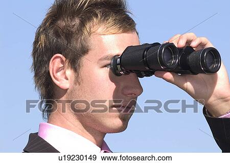 Stock Photo - Man with Binoculars. Fotosearch