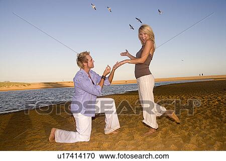 Stock Image - Marry me at the beach. Fotosearch