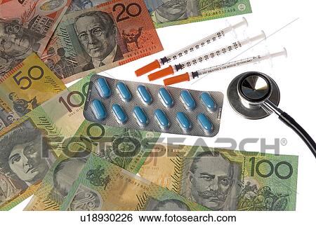 Money and medicine View Large Photo Image Stock Photograph - Money and medicine. Fotosearch