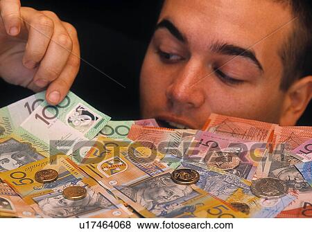 Stock Photo - Money grab. Fotosearch
