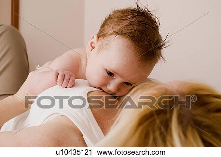 Stock Image - Mother and baby. Fotosearch