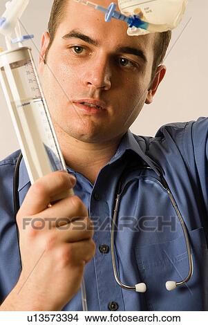 Nurse with drip View Large Photo Image Picture - Nurse with drip. Fotosearch