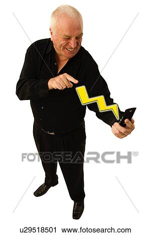 Stock Image - Older man holding cell phone. Fotosearch