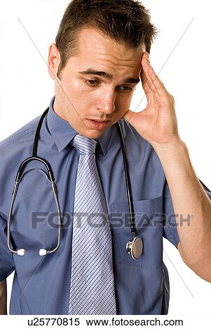 Over worked doctor View Large Photo Image Stock Photography - Over worked doctor. Fotosearch