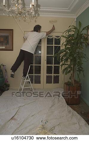 Painting a room View Large Photo Image Stock Image - Painting a room. Fotosearch