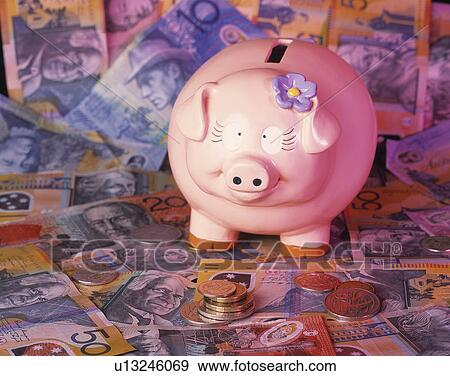 Stock Photo - Piggy band and Austrian dollars. Fotosearch