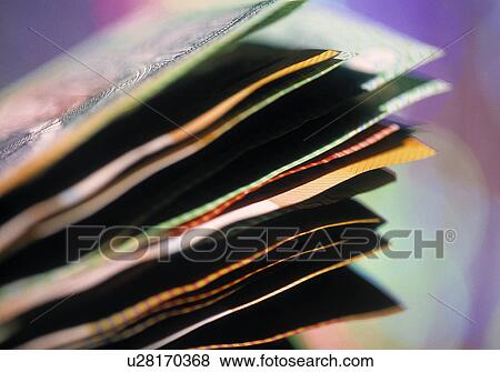 Stock Photo - Pile of cash. Fotosearch