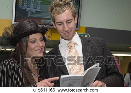 Placing a bet View Large Photo Image Stock Photograph - Placing a bet. Fotosearch