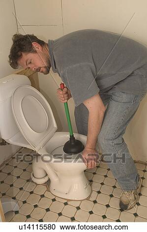 Plunging the toilet View Large Photo Image Stock Image - Plunging the toilet. Fotosearch